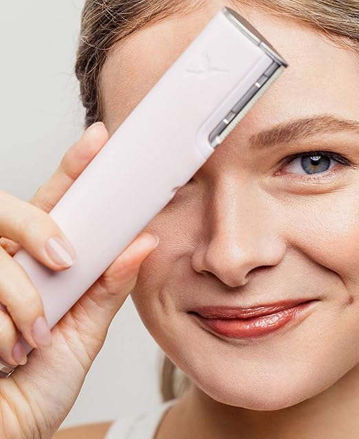 Afeitadora facial eléctrica